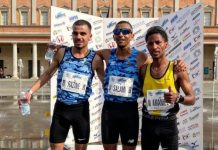 Podismo – Marco Salami ottimo secondo alla “21 di Reggio” Il podio con Marco Salami al centro